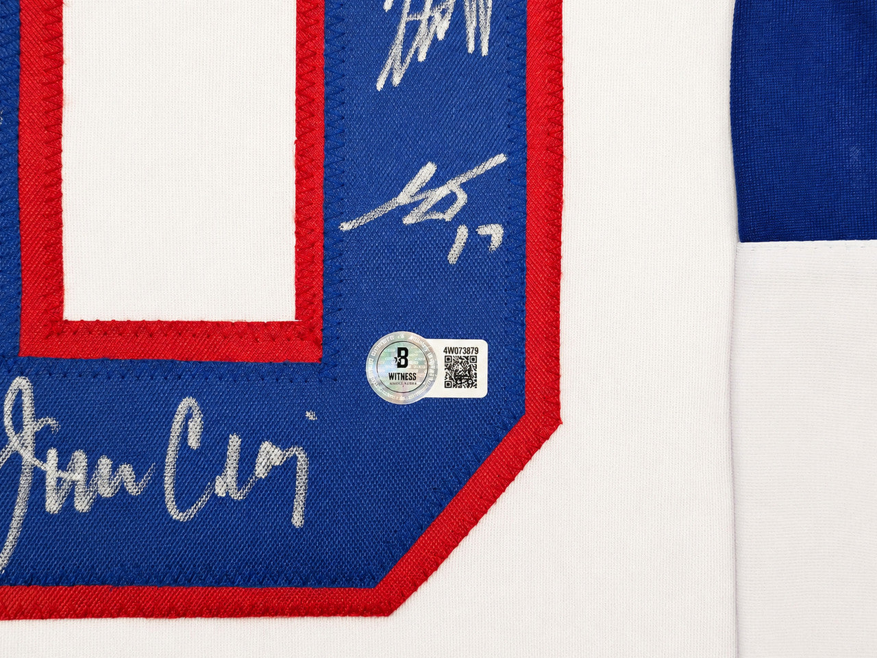1980 Team USA Miracle on Ice Autographed Framed White Jersey "Do You Believe In Miracles?!" With 18 Signatures Including Eruzione & Craig Beckett BAS Witness Stock #262550