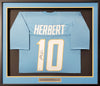 Los Angeles Chargers Justin Herbert Autographed Framed Powder Blue Jersey Beckett BAS Stock #191176