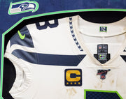 Russell Wilson Framed Game Used Seattle Seahawks White Nike Jersey With Captain's Patch & NFL 100 Logo Unsigned SKU #203517