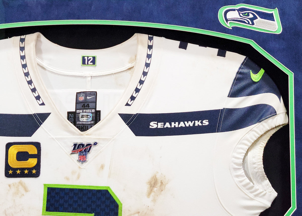 Russell Wilson Framed Game Used Seattle Seahawks White Nike Jersey With Captain's Patch & NFL 100 Logo Unsigned SKU #203517