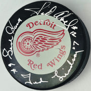 Gordie Howe, Sid Abel, & Ted Lindsay Autographed Official Detroit Red Wings Logo Hockey Puck Production Line Beckett BAS #AE85133