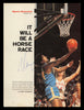 Marques Johnson Autographed 8x11 Magazine Photo UCLA SKU #238094