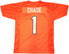 Cincinnati Bengals Ja'Marr Chase Autographed Orange Jersey Beckett BAS Witness Stock #226403
