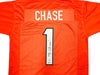 Cincinnati Bengals Ja'Marr Chase Autographed Orange Jersey Beckett BAS Witness Stock #226403