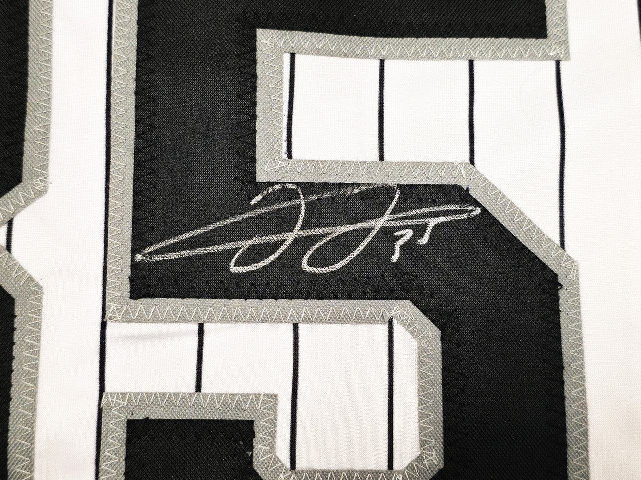 Chicago White Sox Frank Thomas Autographed White Pinstripe Jersey Beckett BAS Witness Stock #239749