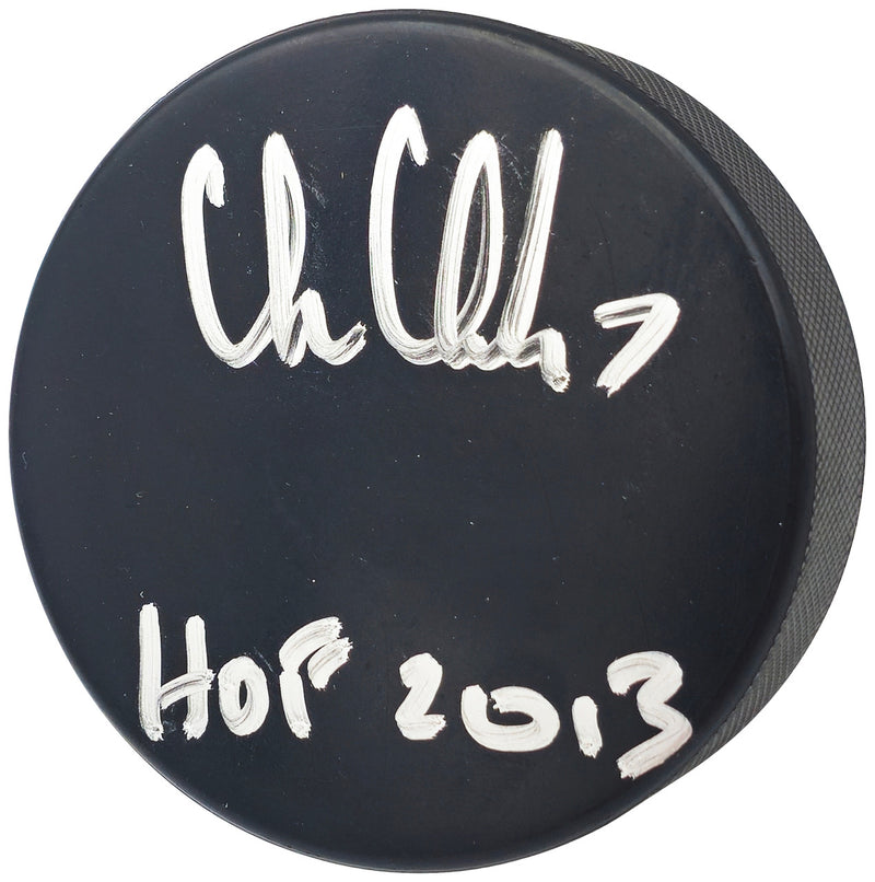 Chris Chelios Autographed Official Chicago Blackhawks Logo Hockey Puck "HOF 2013" Beckett BAS Witness Stock #232841