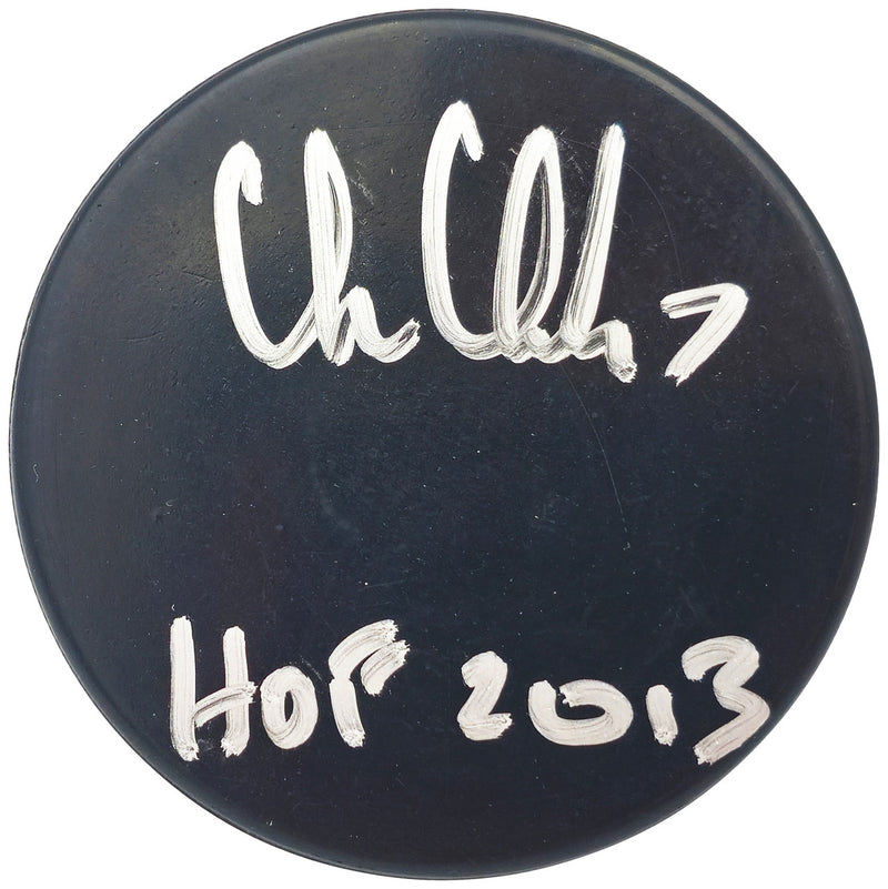 Chris Chelios Autographed Official Chicago Blackhawks Logo Hockey Puck "HOF 2013" Beckett BAS Witness Stock #232841