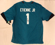 Jacksonville Jaguars Travis Etienne Autographed Teal Nike Jersey JSA #AU30140
