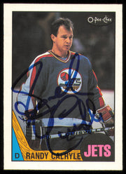 Randy Carlyle Autographed 1987-88 O-Pee-Chee Card #9 Winnipeg Jets SKU #255280
