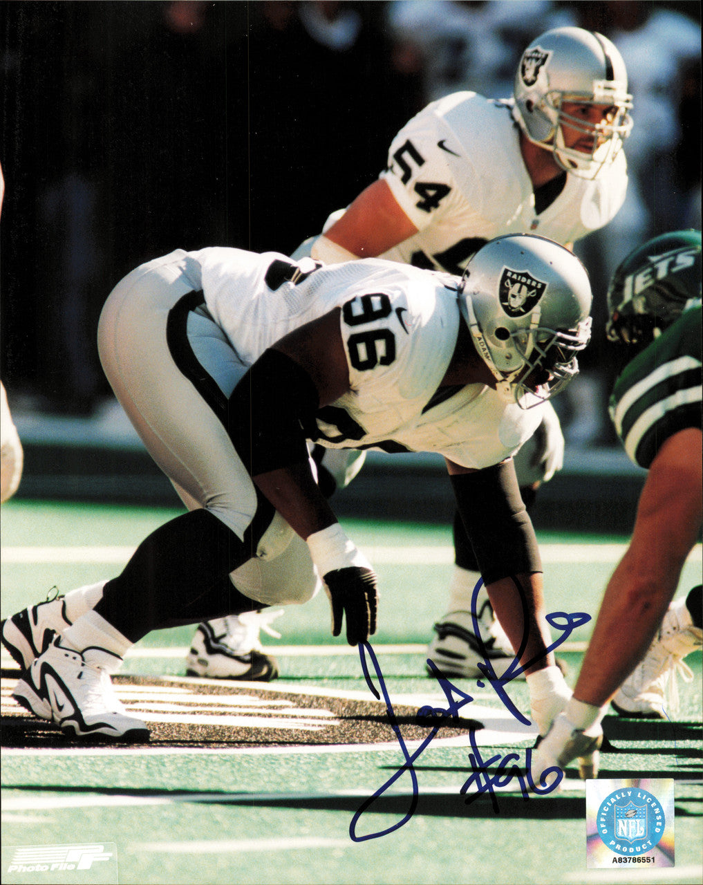 Darrell Russell Autographed 8x10 Photo Oakland Raiders SKU #257311