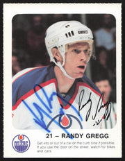 Randy Gregg Autographed 1986-87 Red Rooster Card Edmonton Oilers SKU #258426