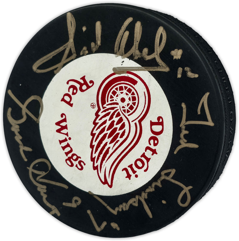Gordie Howe, Sid Abel, & Ted Lindsay Autographed Official Detroit Red Wings Logo Hockey Puck Production Line Beckett BAS #AE85136