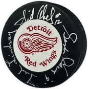 Gordie Howe, Sid Abel, & Ted Lindsay Autographed Official Detroit Red Wings Logo Hockey Puck Production Line Beckett BAS #AE85128