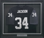 Oakland Raiders Bo Jackson Autographed Framed Black Mitchell & Ness 1987 Throwback Jersey Beckett BAS QR #BU86725