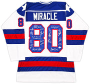 1980 Team USA Miracle on Ice Autographed White Jersey "Do You Believe In Miracles?!" With 18 Signatures Including Eruzione & Craig Beckett BAS Witness Stock #254436