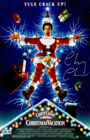 Chevy Chase Autographed 11x17 Movie Poster Christmas Vacation Clark Griswold (In White) Beckett BAS QR Stock #261967