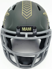 De'Von Achane Autographed Miami Dolphins Dark Green 2025 Salute to Service Speed Mini Helmet Beckett BAS Witness Stock #262076