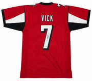 Atlanta Falcons Michael Vick Autographed Red Jersey Beckett BAS Witness Stock #267501