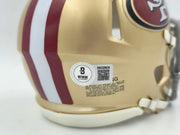 Tom Rathman Autographed San Francisco 49ers Gold Speed Mini Helmet Beckett BAS Witness Stock #253315