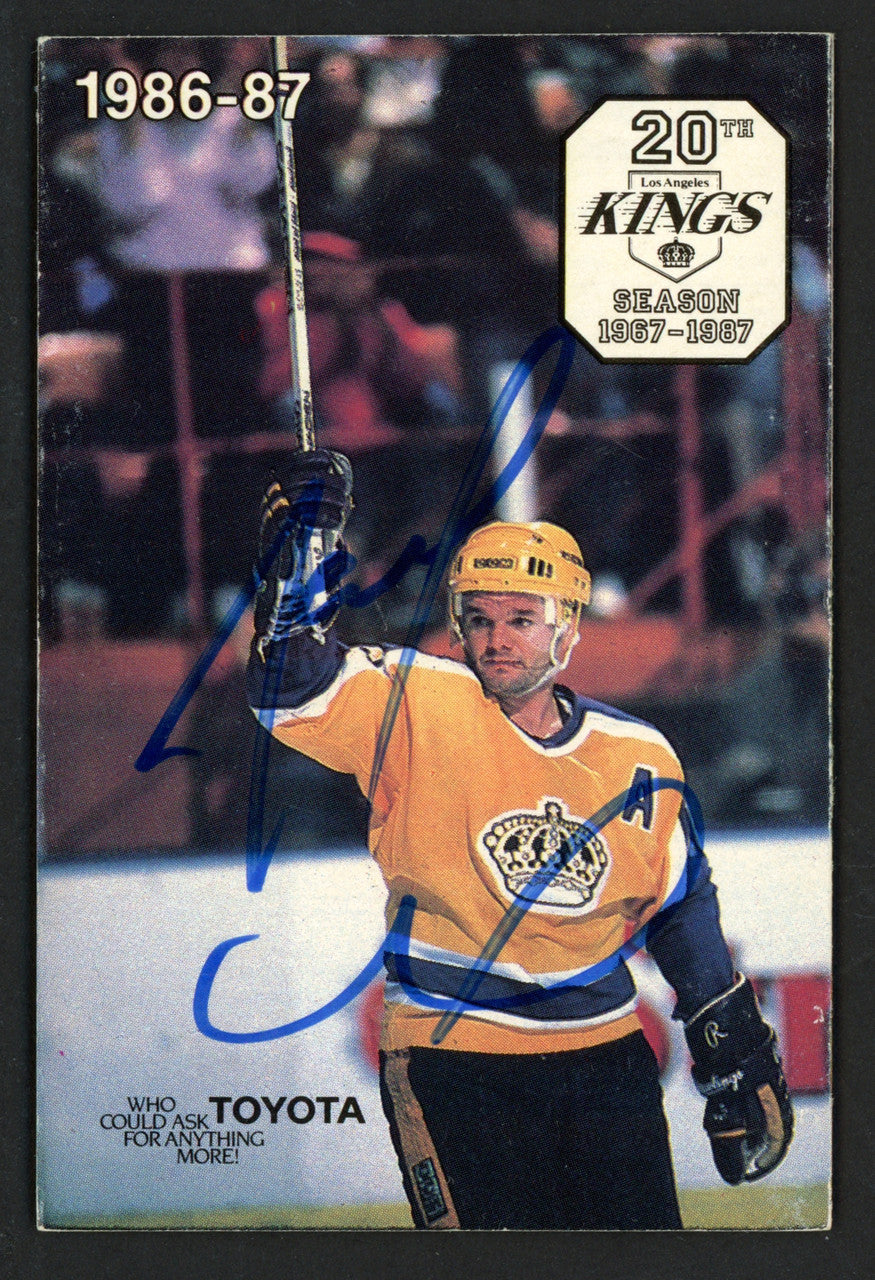 Marcel Dionne Autographed Pocket Schedule Los Angeles Kings SKU #263531