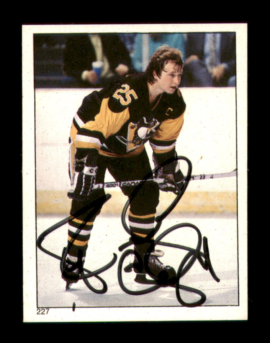 Randy Carlyle Autographed 1983-84 Topps Stickers Card #227 Pittsburgh Penguins SKU #251554