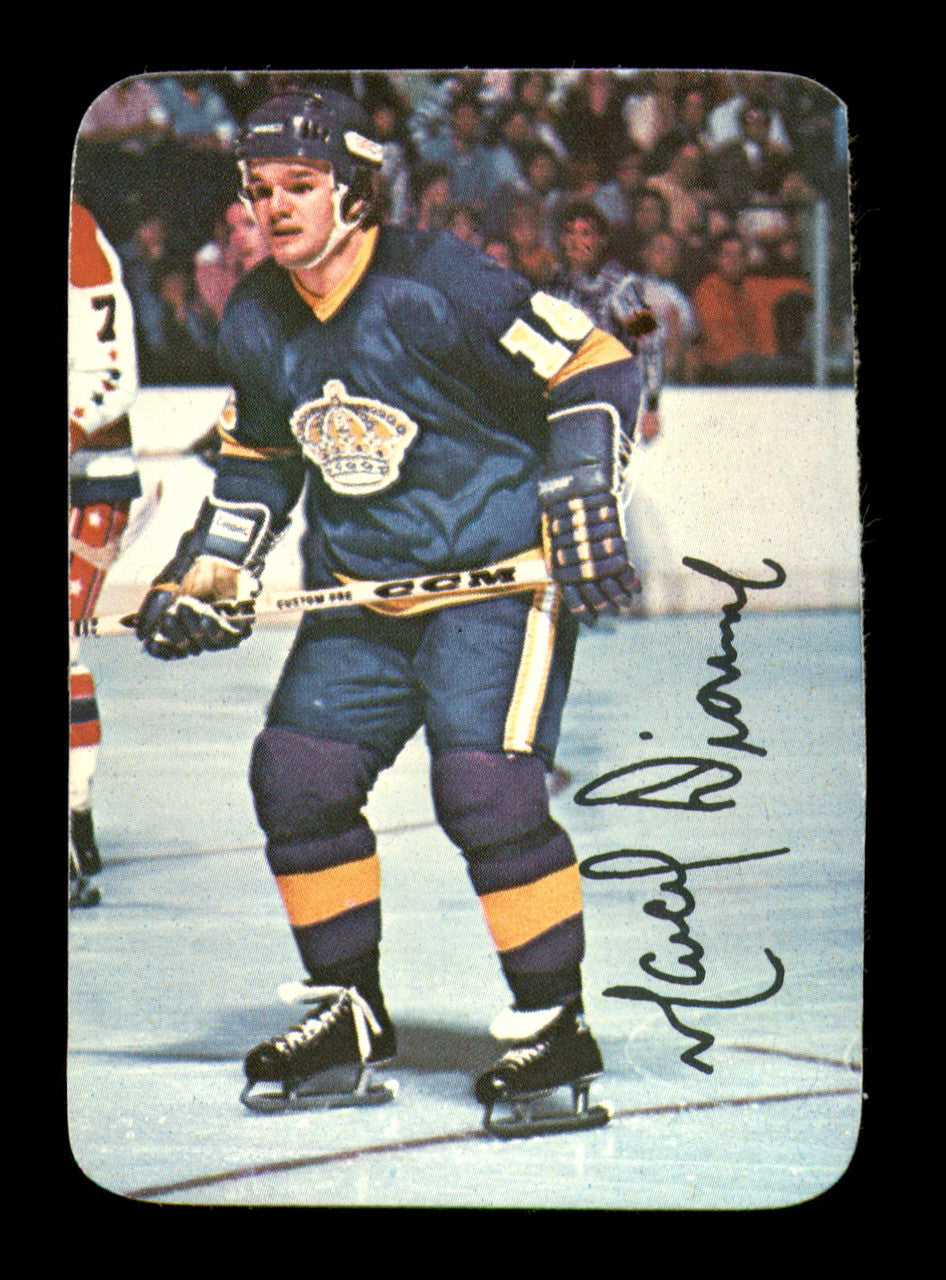 Marcel Dionne Autographed 1976-77 Topps Glossy Card #4 Los Angeles Kings (Signed on Back) SKU #251657