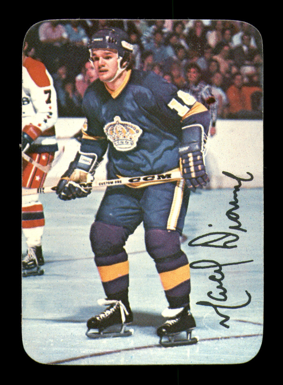 Marcel Dionne Autographed 1976-77 Topps Glossy Card #4 Los Angeles Kings (Signed on Back) SKU #251662