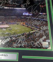 Seattle Seahawks Super Bowl XLVIII Champion Autographed Framed 16x20 Photo With 27 Signatures Including Russell Wilson, Marshawn Lynch & Richard Sherman MCS Holo Stock #90706