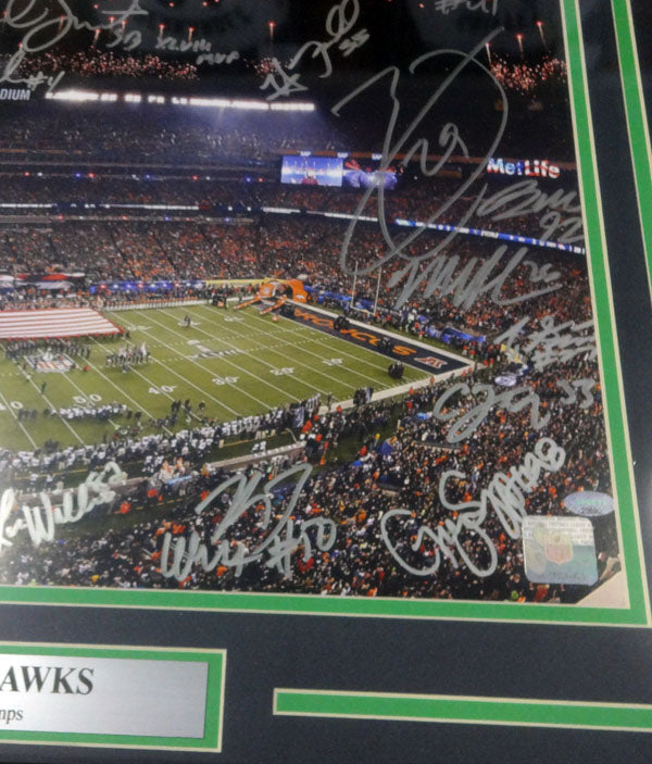 Seattle Seahawks Super Bowl XLVIII Champion Autographed Framed 16x20 Photo With 27 Signatures Including Russell Wilson, Marshawn Lynch & Richard Sherman MCS Holo Stock #90706
